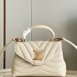 Leather handbag with a crossbody strap
