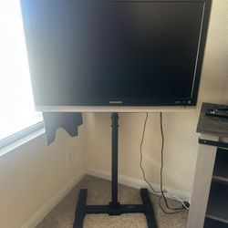 32” TV Mounted On Stand