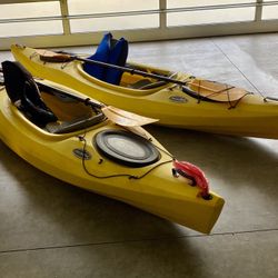 Two Equinox Kayaks And Two Life Jackets