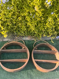 Two Items: Rustic Two Tier Round Wooden Shelf Racks Featuring A Natural Wood Finish and Decorative Rope Hangers Plus Metal Hangers Behind The Frame