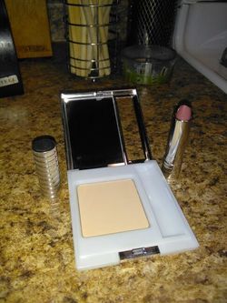 Brand new clinique powder/lipstick combo