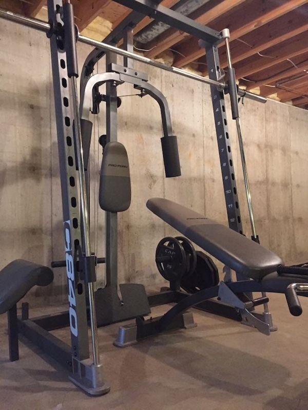 Smith machine weight set bench with weights c840 for Sale in Saint Charles MO OfferUp