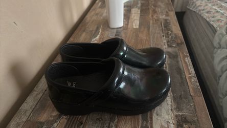 Dansko black with a green shine to them nurses shoes