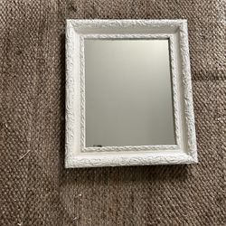 Vintage solid wood mirror in antique white