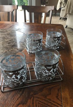 Four brand new candle holder