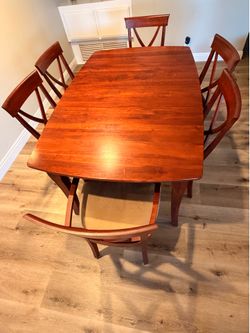 Polished mahogany, redwood dining room table