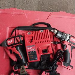 MILWAUKEE IMPACT DRIVER AND DRILL 18V LITHIUM WITH BATTERYS AND CHARGER 