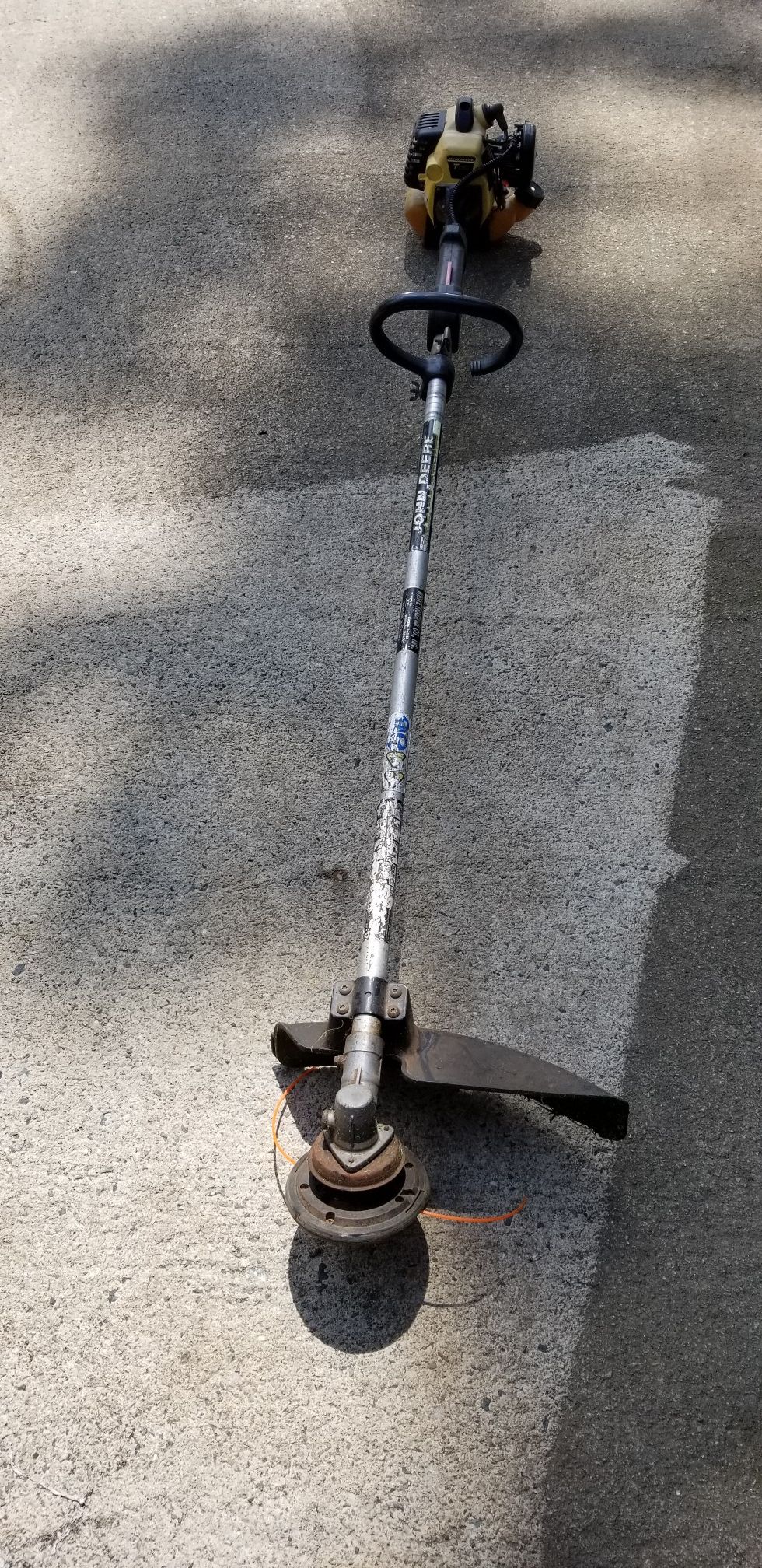 John deere t105s staight shaft trimmer weed eater.