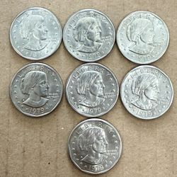 1979 circulated: Susan B Anthony silver dollar coin minted in Denver, Co. United States.  Lot:(7-Coins). Narrow & Wide Rims. OFFERS!
