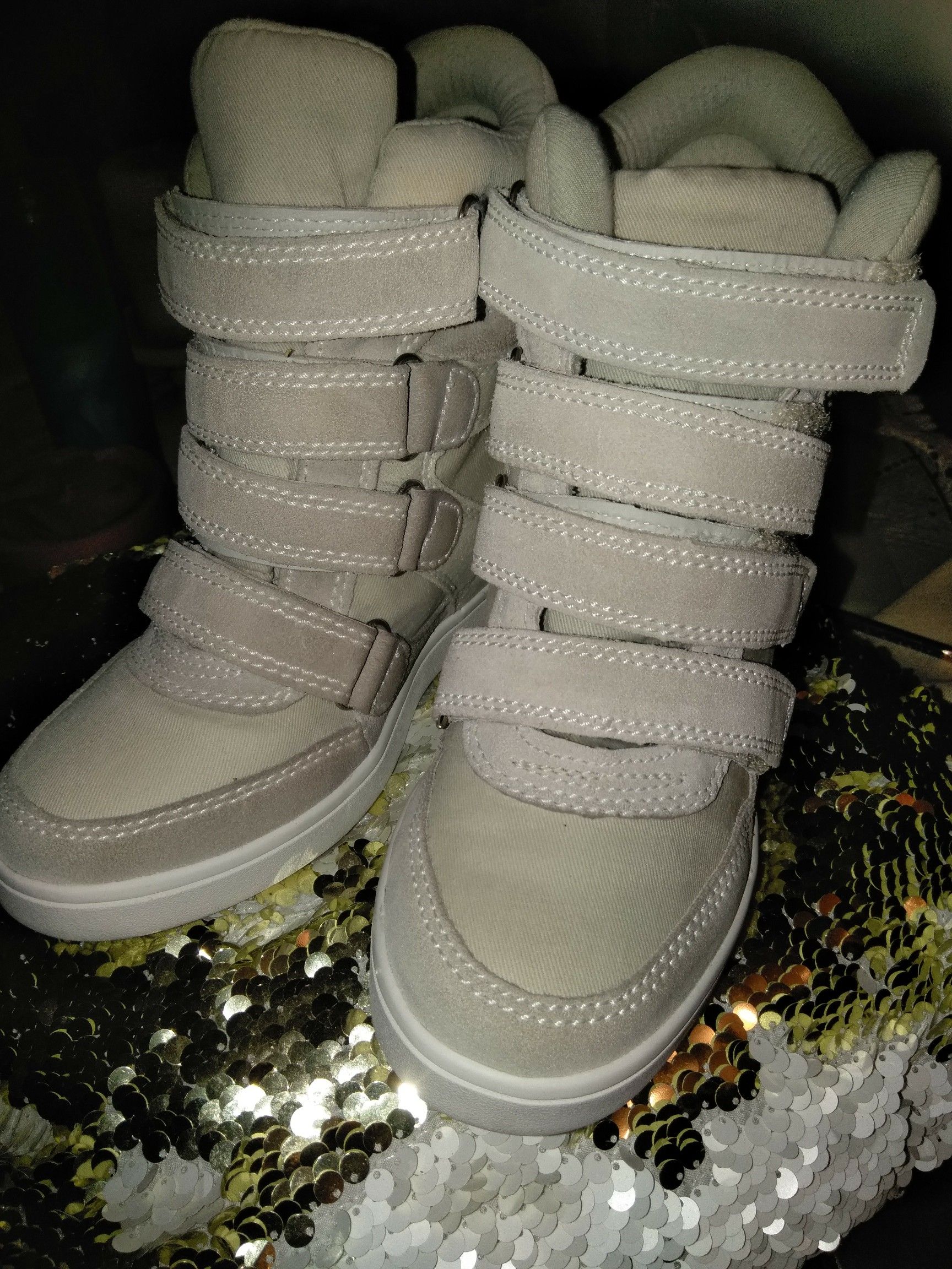 Ivory chrism wedge sneakers high tops.