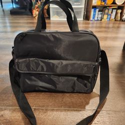 Black Similac diaper bag. Side pouch, front and side pockets.13x11x6 inch, Clean and  good condition 