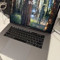 Apple MacBook Pro with 2.3 GHz Intel Core i9, 15-inch, 16GB RAM, 512GB SSD Space Gray
