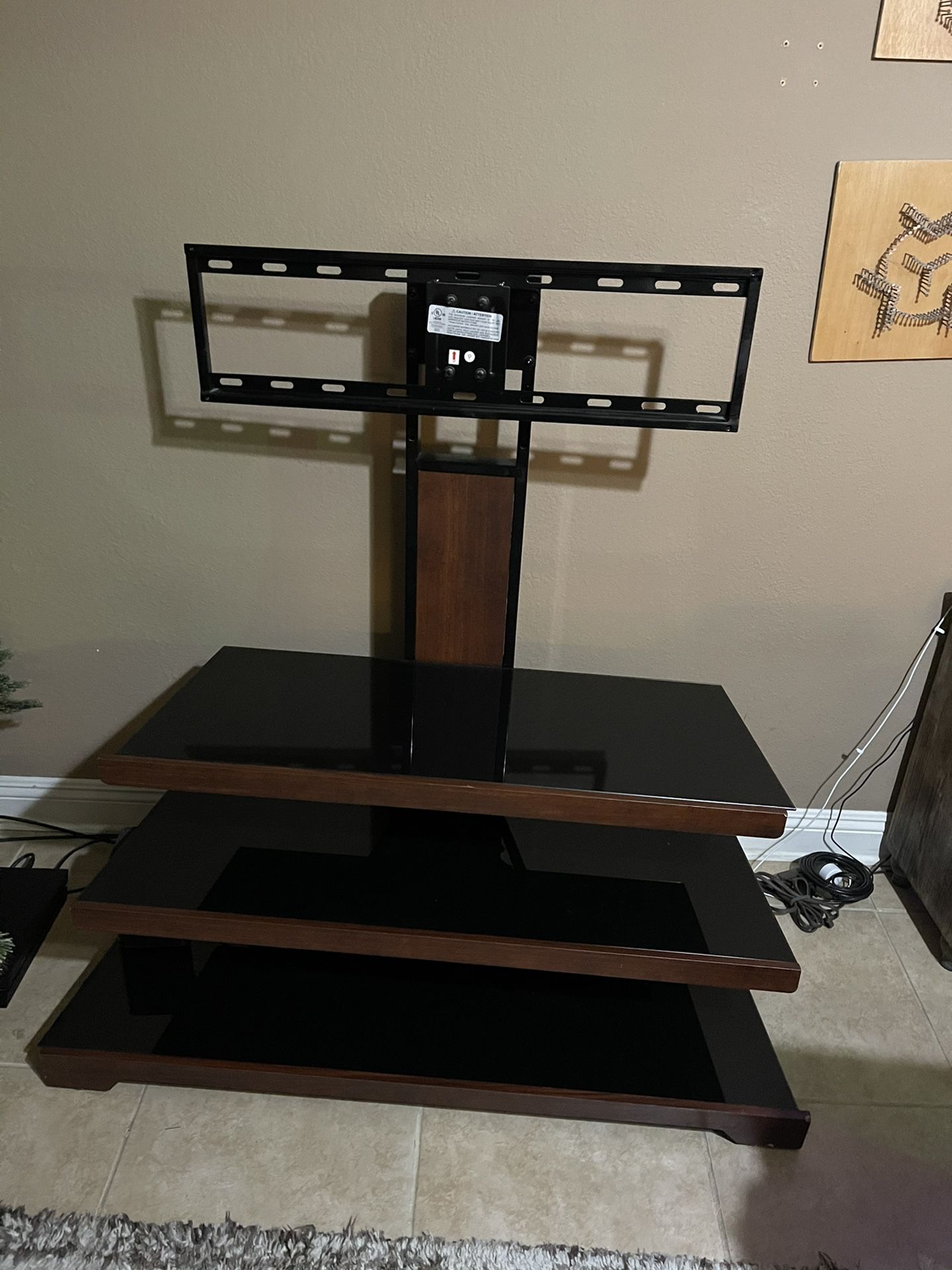 Tv stand with rotating mount attached.