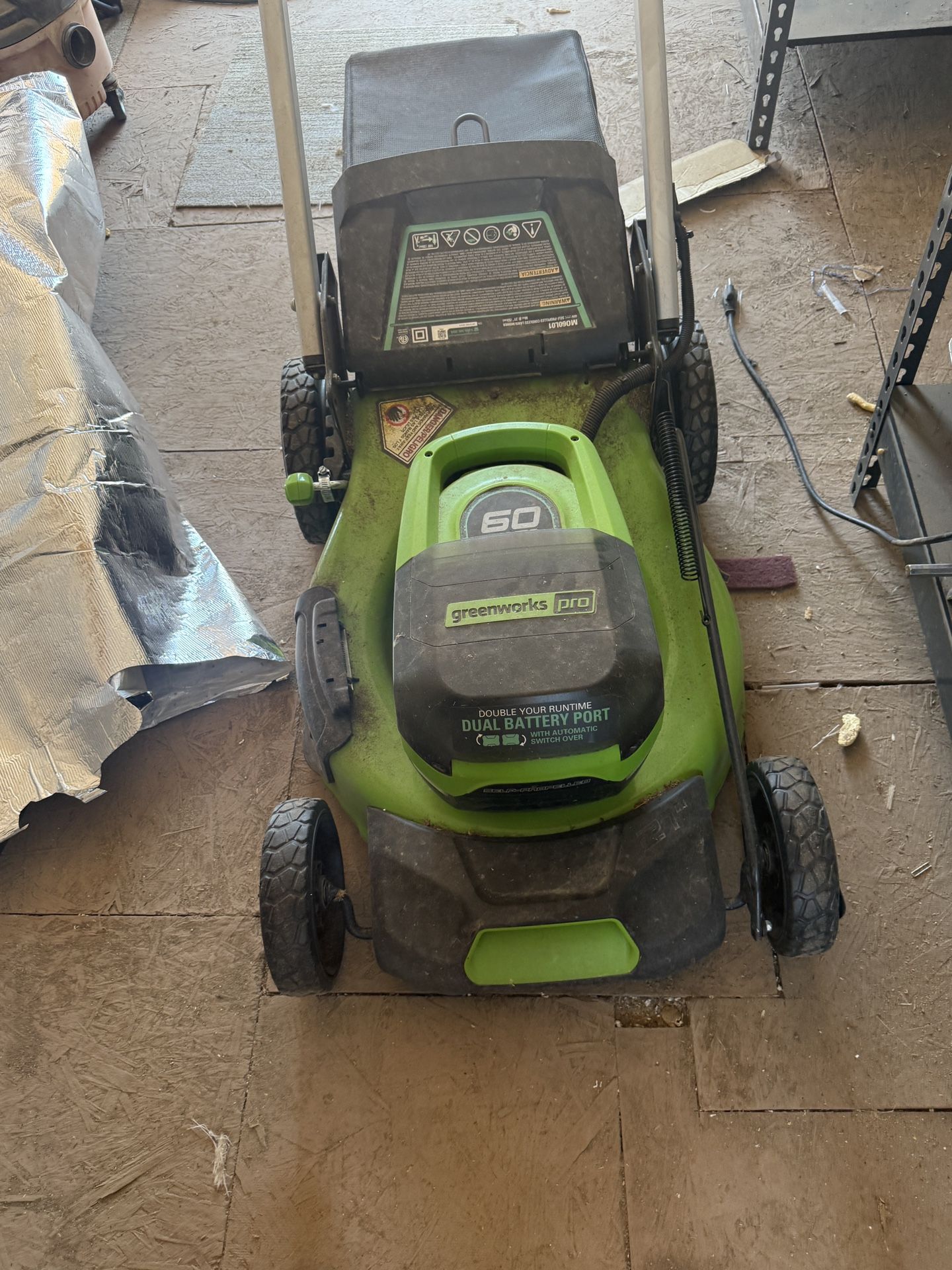 Green Works Mower With 2 Brand new Batteries And Charger