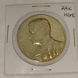 Theodore Roosevelt commemorative medal or token. It is a  24K HGE (Heavy Gold Electroplate) version