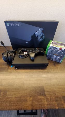 Xbox One X 1TB with 13 Games & Headset