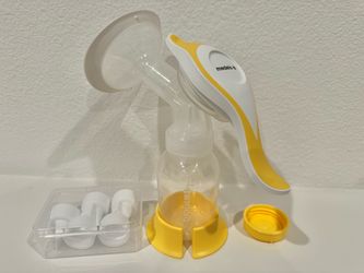 Medela Harmony Manual Breast Pump with Brand New Valves