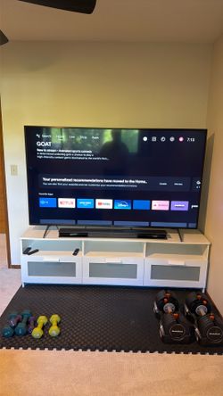 65 inch Sony Bravia TV very well kept and barely used it comes with TV stand