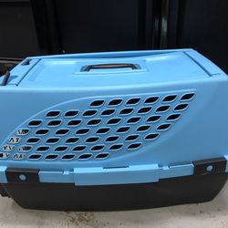 Small blue & black dog kennel