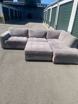 Light Gray Sectional Sofa with Ottoman