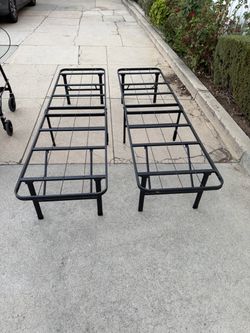 Twin Metal Platform Bed Frames – Set of 2    20” wide  14” high   75” long      25.00 each