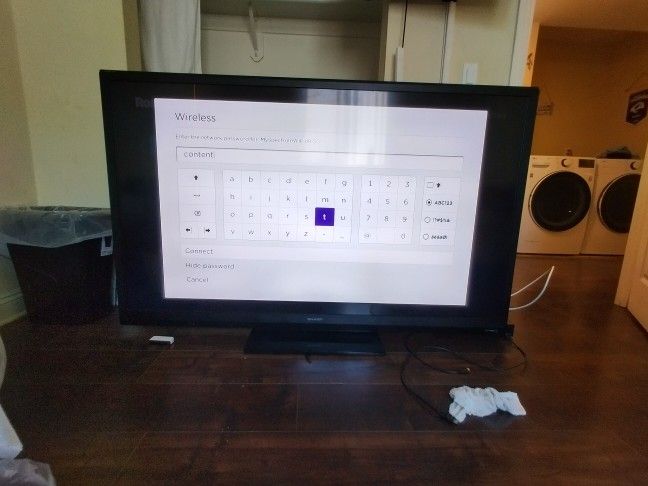 70in Sharp Tv + Roku