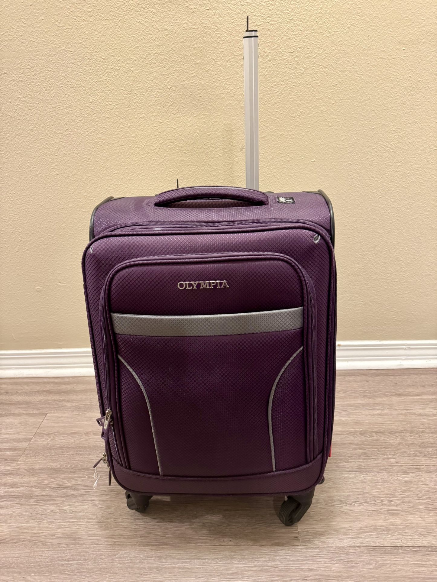 Olympia Purple Suitcase with Wheels 22x14x9-10”