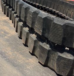 Rubber excavator tracks and commercial tires