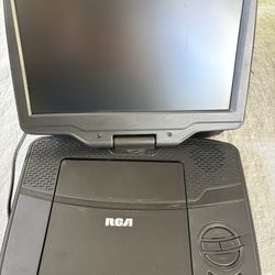 Portable DVD Player And Box Of Movies