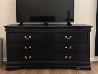 Black dresser and night stand