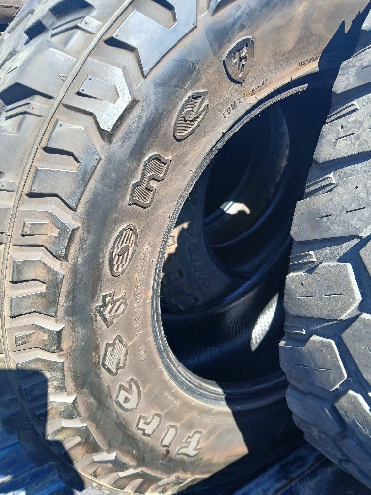 35x12.50R18 Firestone Mud Terrain Tires (2)
