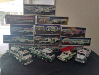 AMAZING HESS TRUCK COLLECTION. (12) NEW IN THE BOX AND (4) NEW NOT IN THE BOX. (16)  VEHICLES IN TOTAL.
