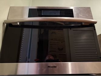 23.5”W x 17.75”H x 17”D Miele steamer