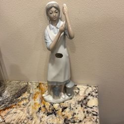 Porcelain Nurse Statue