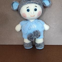 Crocheted Baby. Toy Or Decor 