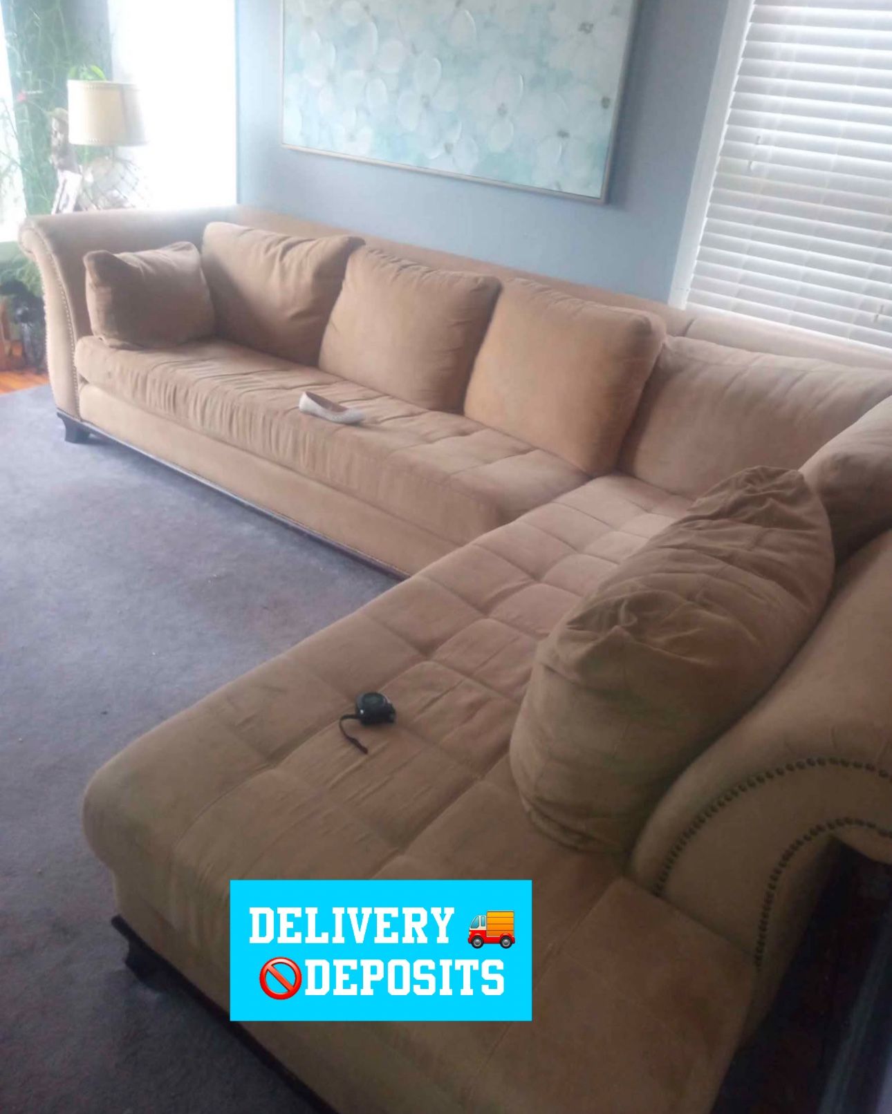Tan studded L shaped Sectional couch