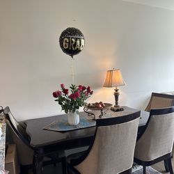 Elegant Dining Table with 6 Upholstered Chairs – $450