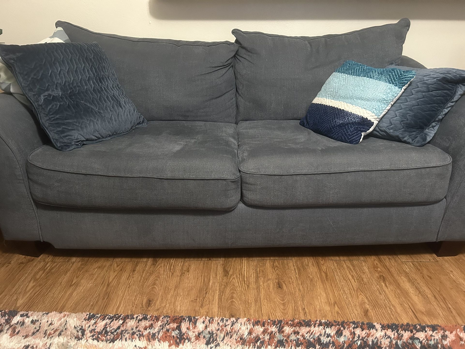 Blue Sofa With Pillows 