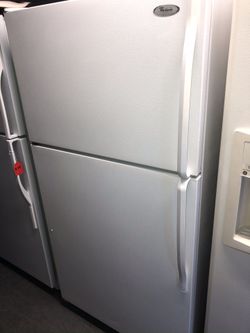Used whirlpool top and bottom fridge. 1 year warranty