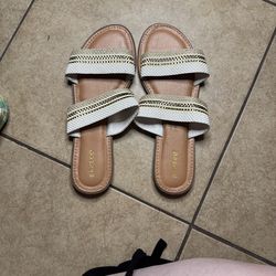 Gold and white sandals