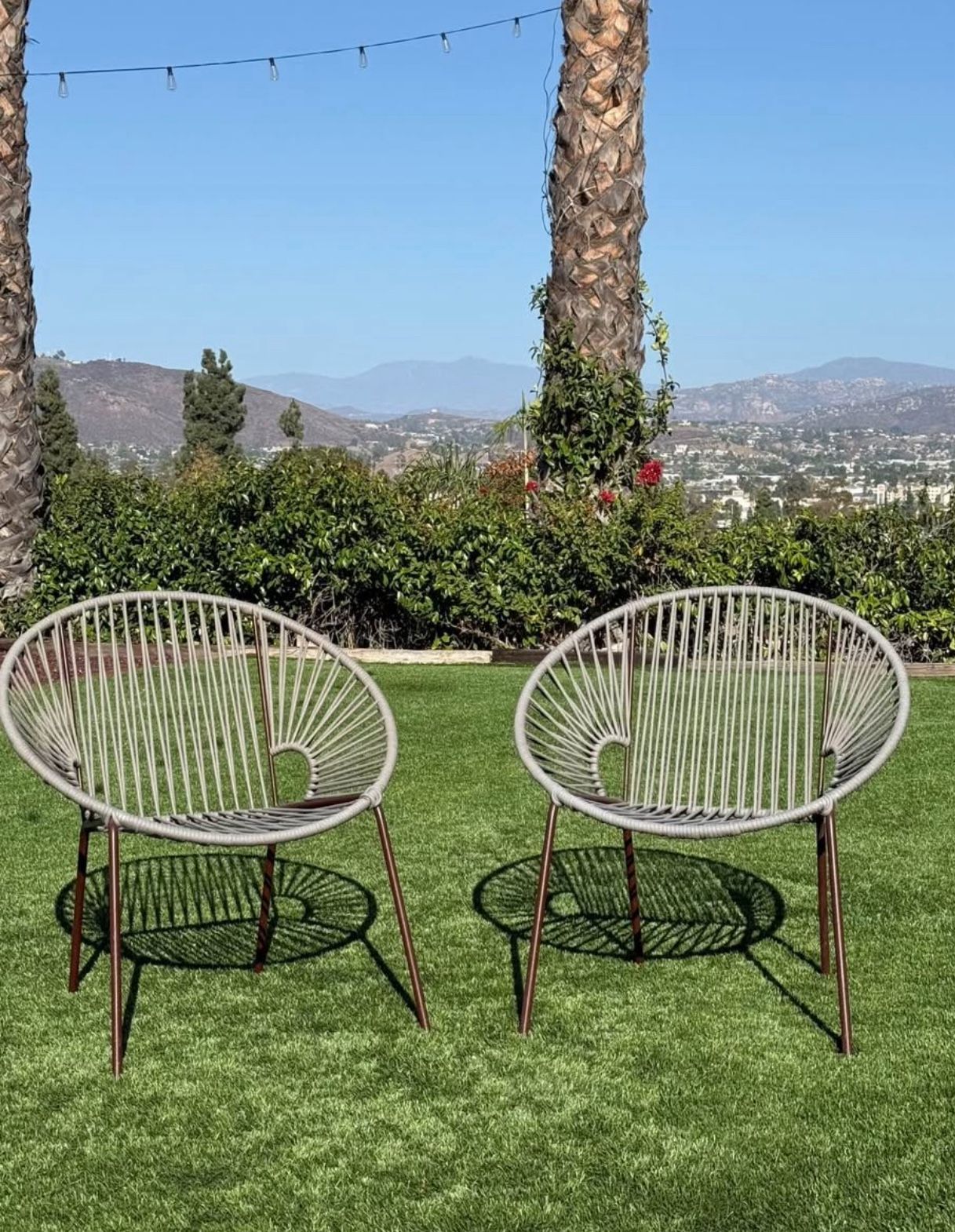 CB2 Indoor/Outdoor Chairs (Acapulco/Ixtapa style)