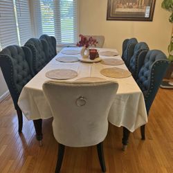 Set of 8 dining table with chairs.