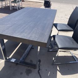 Dining table with bench and two