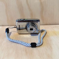Nikon COOLPIX S01 10.1MP Digital Camera Mirror Silver Tested Good w/Charger Read