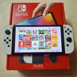 NINTENDO SWITCH OLED VERSION with 7500 GAMES INSTALLED