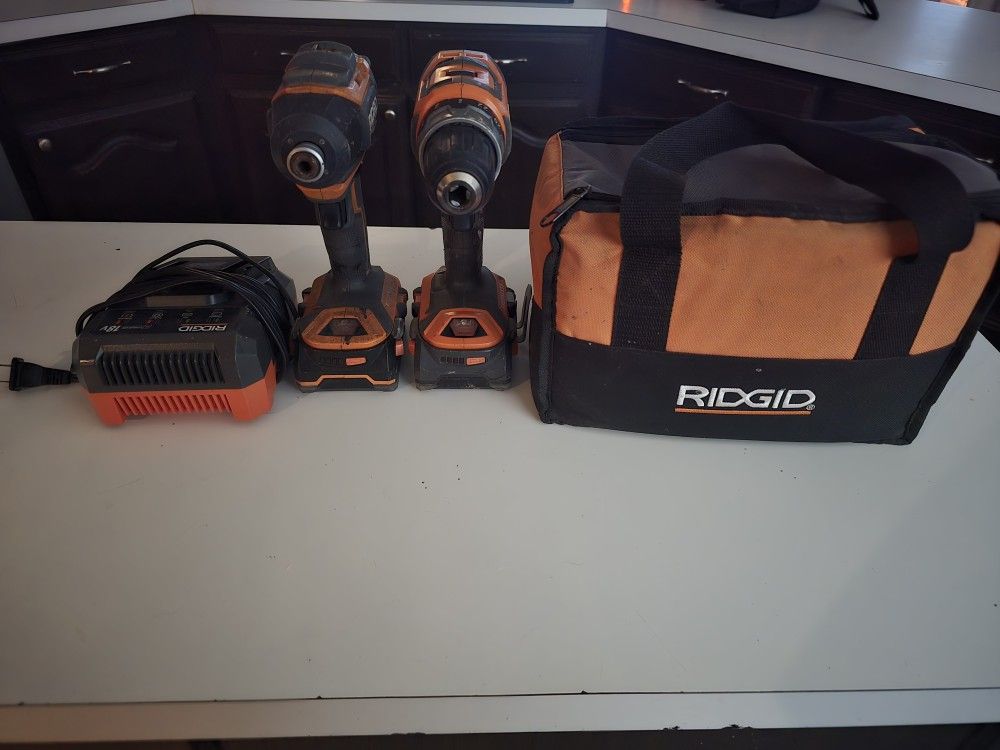 Rigid Drills Batteries Charger And Bag READ INFO