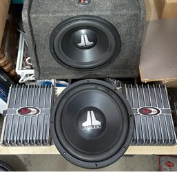 Two 12” JL Audio  W6 & Two punch amps