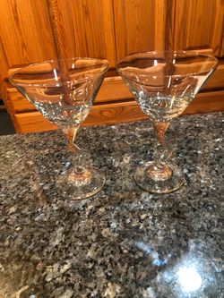 Crystal Martini Glasses set of 2 with a pretty swirly design stems. Size 6 1/2 inches tall. Brand New Never Used. Has been on display in a crystal