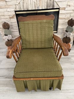 This is a vintage mid-century maple rocking chair