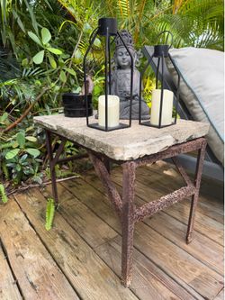 Small rustic outdoor table with slab top